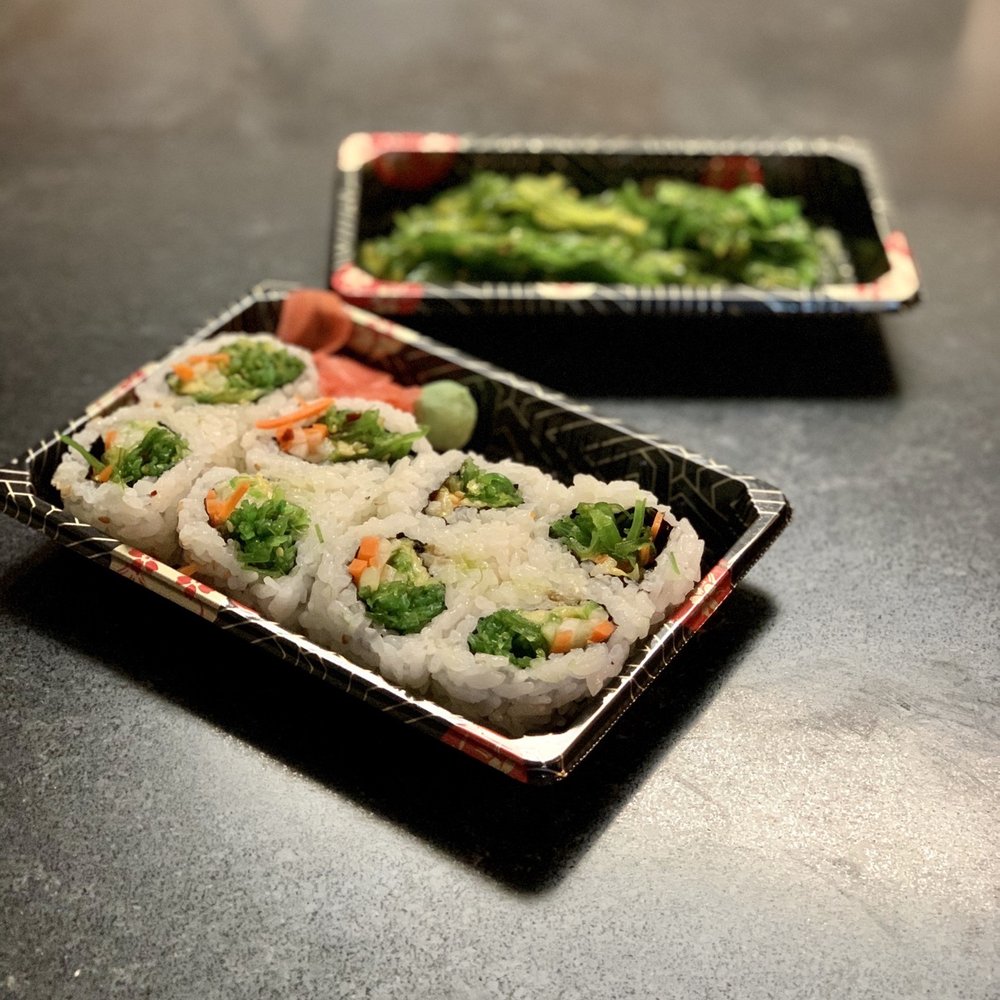 Vegetable roll and seaweed salad Vegetable roll and seaweed salad