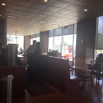Caffè Artigiano - people sitting at tables in a coffee shop - Coffee & Tea Near Me - Calgary, Alberta Caffè Artigiano - people sitting at tables in a coffee shop - Coffee & Tea Near Me - Calgary, Alberta