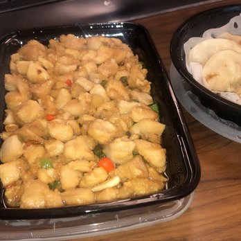 Hu's Cooking - 3 cup chicken, steamed pork dumplings and steamed rice. - Chinese Near Me - Houston, Texas