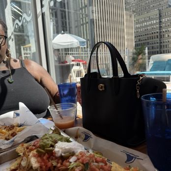 Margaritaville - Times Square - Loaded nachos and drinks - American Near Me - New York, New York