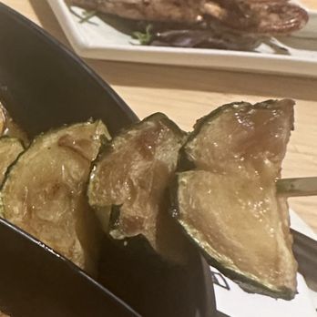 Kyuramen - The zucchini skewer that came with my ramen. Please make Quality vegetable skewer and grill it.  old, soggy less appealing - Ramen Near Me - Henderson, Nevada
