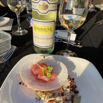Cielo Rooftop Bar - a plate of food and wine on a table - Lounges Near Me - San Jose, California