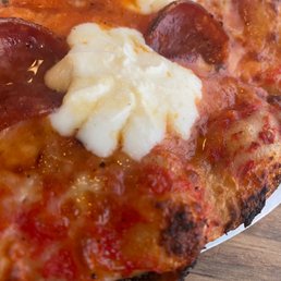 a slice of pepperoni and cheese pizza a slice of pepperoni and cheese pizza
