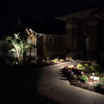 Dragonfly Landscapes - a front yard at night - Landscaping Near Me - Vero Beach, Florida Dragonfly Landscapes - a front yard at night - Landscaping Near Me - Vero Beach, Florida