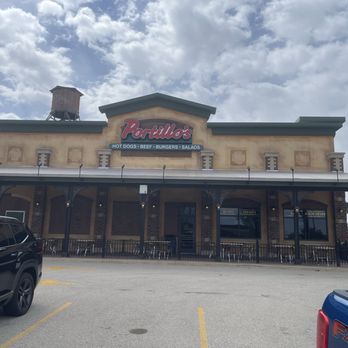 Portillo's Normal - The outside of the building. - Hot Dogs Near Me - Normal, Illinois Portillo's Normal - The outside of the building. - Hot Dogs Near Me - Normal, Illinois