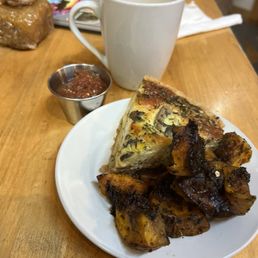 Mushroom onion quiche with a side of herb, roasted butternut squash. A side of flavorful salsa.