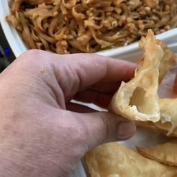 Empty Crab Rangoon and Dark Brown Chicken not so Pad Thai.  Yuck!