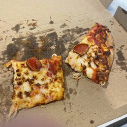 Pizza with barely any toppings