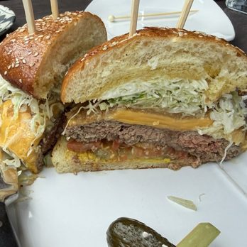 Noble Tavern - Their burger. Pretty darn tasty. Good flavor on the meat and tasty toppings. - Cocktail Bars Near Me - St. Petersburg, Florida