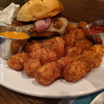 The Blue Duck - Fried chicken sandwich with mayo on side and tots. Delicious.only negative was that the batter came off the chicken breast very easily. - Sandwiches Near Me - Maplewood, Missouri