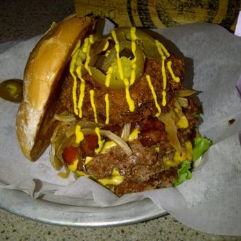 AJ Bombers - triple bomber burger with a cheese stuffed portabella, bacon and fried onions - Burgers Near Me - Milwaukee, Wisconsin AJ Bombers - triple bomber burger with a cheese stuffed portabella, bacon and fried onions - Burgers Near Me - Milwaukee, Wisconsin