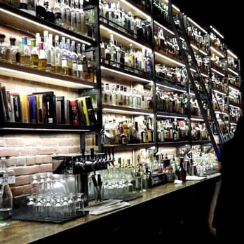 Paper Plane - The infamous wall of fancy liquor - Cocktail Bars Near Me - San Jose, California Paper Plane - The infamous wall of fancy liquor - Cocktail Bars Near Me - San Jose, California
