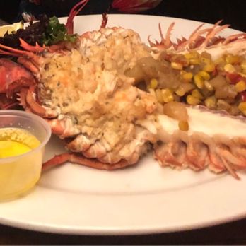 The BoatYard Grill - Lobster stuffed with shrimp and crab, with "corn salsa" (it's a hash with veggies...) - Seafood Near Me - Ithaca, New York The BoatYard Grill - Lobster stuffed with shrimp and crab, with "corn salsa" (it's a hash with veggies...) - Seafood Near Me - Ithaca, New York