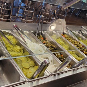 Pappas Bar-B-Q - Toppings bar. BBQ sauces and silverware in side - Barbeque Near Me - Pasadena, Texas