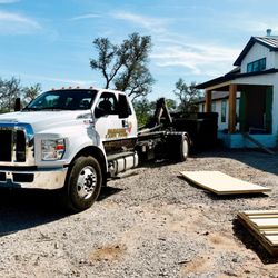 Paradise Landcare - Paradise Landcare TX Dumpster Rental At A Construction New Development Job Site