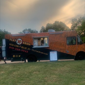 The Flat Drum - an orange and black food truck - Chicken Wings Near Me The Flat Drum - an orange and black food truck - Chicken Wings Near Me