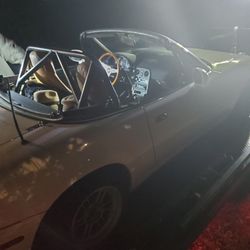 Billy's Auto Repair & Towing - Miata loading up on flatbed