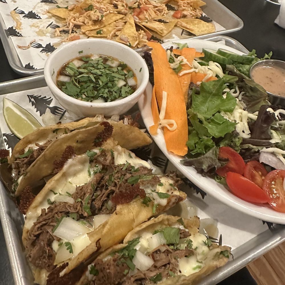 Twisted Pine - Birria Tacos with Salad and Nachos with Chicken - Bars Near Me - Winston-Salem, North Carolina Twisted Pine - Birria Tacos with Salad and Nachos with Chicken - Bars Near Me - Winston-Salem, North Carolina