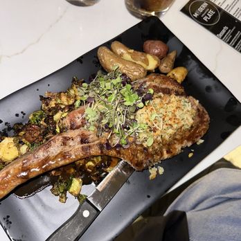 Modern Plate - Tomahawk Pork Chop - Cocktail Bars Near Me - Elmhurst, Illinois
