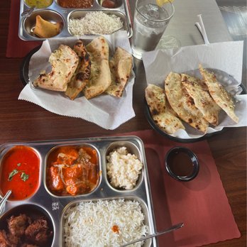 Saffron Indian Restaurant - lentil and tomato soup, vegetable samosa, chicken masala and curry, garlic naan, onion Bhaji, rice pudding (kheer), gulab jamun - Indian Near Me - Clermont, Florida