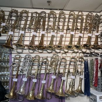 Jon Baltimore Music Co. - Trombone wall - Musical Instruments & Teachers Near Me - New York, New York Jon Baltimore Music Co. - Trombone wall - Musical Instruments & Teachers Near Me - New York, New York