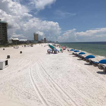 Pineapple Willy's - View down the beach from our table on the pier - Seafood Near Me - Panama City Beach, Florida Pineapple Willy's - View down the beach from our table on the pier - Seafood Near Me - Panama City Beach, Florida