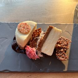 The Lodge Restaurant - Mascarpone Cheesecake w/blueberry compote, lemon snow, and almond florentine.