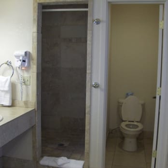 The Lodge on Route 66 - Shower and water closet - Hotels Near Me - Williams, Arizona The Lodge on Route 66 - Shower and water closet - Hotels Near Me - Williams, Arizona