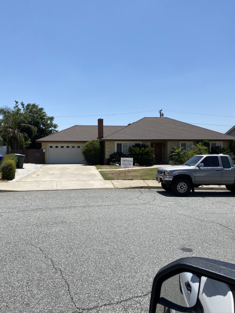 Slide of Imperial Roofing
