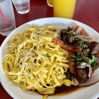 Fusion Peru - Tallarin a la Huancaina which was a Peruvian style pasta with beef and passion fruit juice - Food Trucks Near Me - College Station, Texas Fusion Peru - Tallarin a la Huancaina which was a Peruvian style pasta with beef and passion fruit juice - Food Trucks Near Me - College Station, Texas