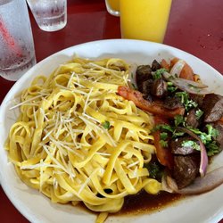 Tallarin a la Huancaina which was a Peruvian style pasta with beef and passion fruit juice