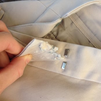 Finest Dry Cleaning - TORN pants, courtesy of "Finest" Dry Cleaning.  
Clasp was completely ripped off--just like I was. - Dry Cleaning Near Me - San Francisco, California