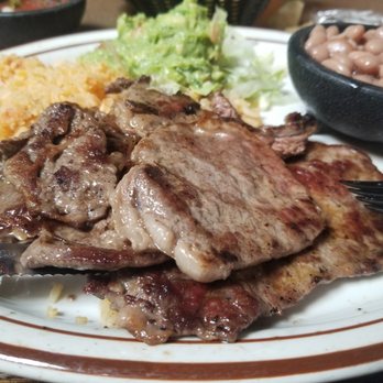 Avilas El Ranchito - Carne asada steak with rice, vegetarian beans (the refried beans contain lard), salad and guacamole - Mexican Near Me - Costa Mesa, California Avilas El Ranchito - Carne asada steak with rice, vegetarian beans (the refried beans contain lard), salad and guacamole - Mexican Near Me - Costa Mesa, California