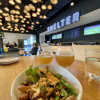 Shelter - a bowl of food and a glass of beer - Beer, Wine & Spirits Near Me - Washington, DC, District of Columbia