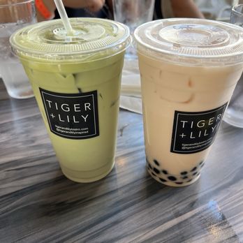 Tiger + Lily - Matcha latte (left), Taiwanese milk tea with boba (right) - Asian Fusion Near Me - Columbus, Ohio Tiger + Lily - Matcha latte (left), Taiwanese milk tea with boba (right) - Asian Fusion Near Me - Columbus, Ohio