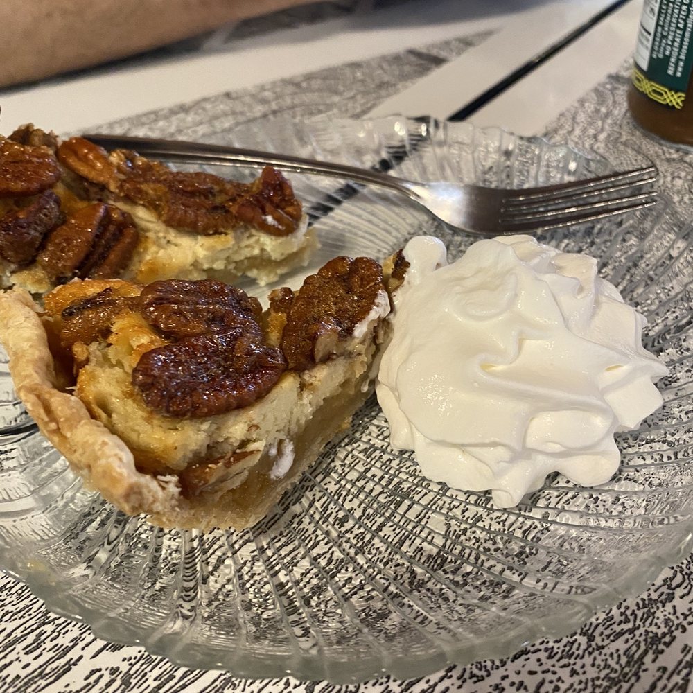 Woods Creek Cafe - Pecan pie with a chew cake like filling. - Breakfast & Brunch Near Me - Jamestown, California Woods Creek Cafe - Pecan pie with a chew cake like filling. - Breakfast & Brunch Near Me - Jamestown, California