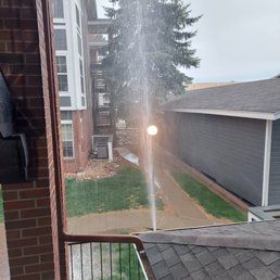 Broken sprinkler head wasting water. Broken sprinkler head wasting water.
