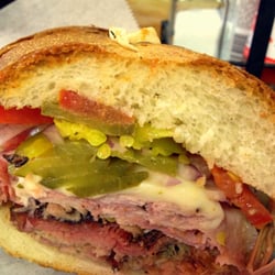 The Ravioli House - Mojo | $8 | 4.3/5 | smoked pork shoulder, ham, swiss, pickles, tomato, onions, spicy cuban "Mojo" sauce, on a toasted roll.