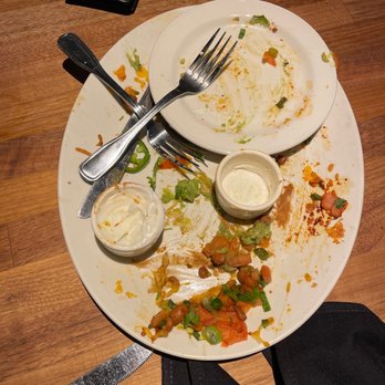 Yard House - Chicken Nacho Appetizer made us cancel our Entrees. It was so much food. Small side plate for reference. - New American Near Me - Sacramento, California Yard House - Chicken Nacho Appetizer made us cancel our Entrees. It was so much food. Small side plate for reference. - New American Near Me - Sacramento, California