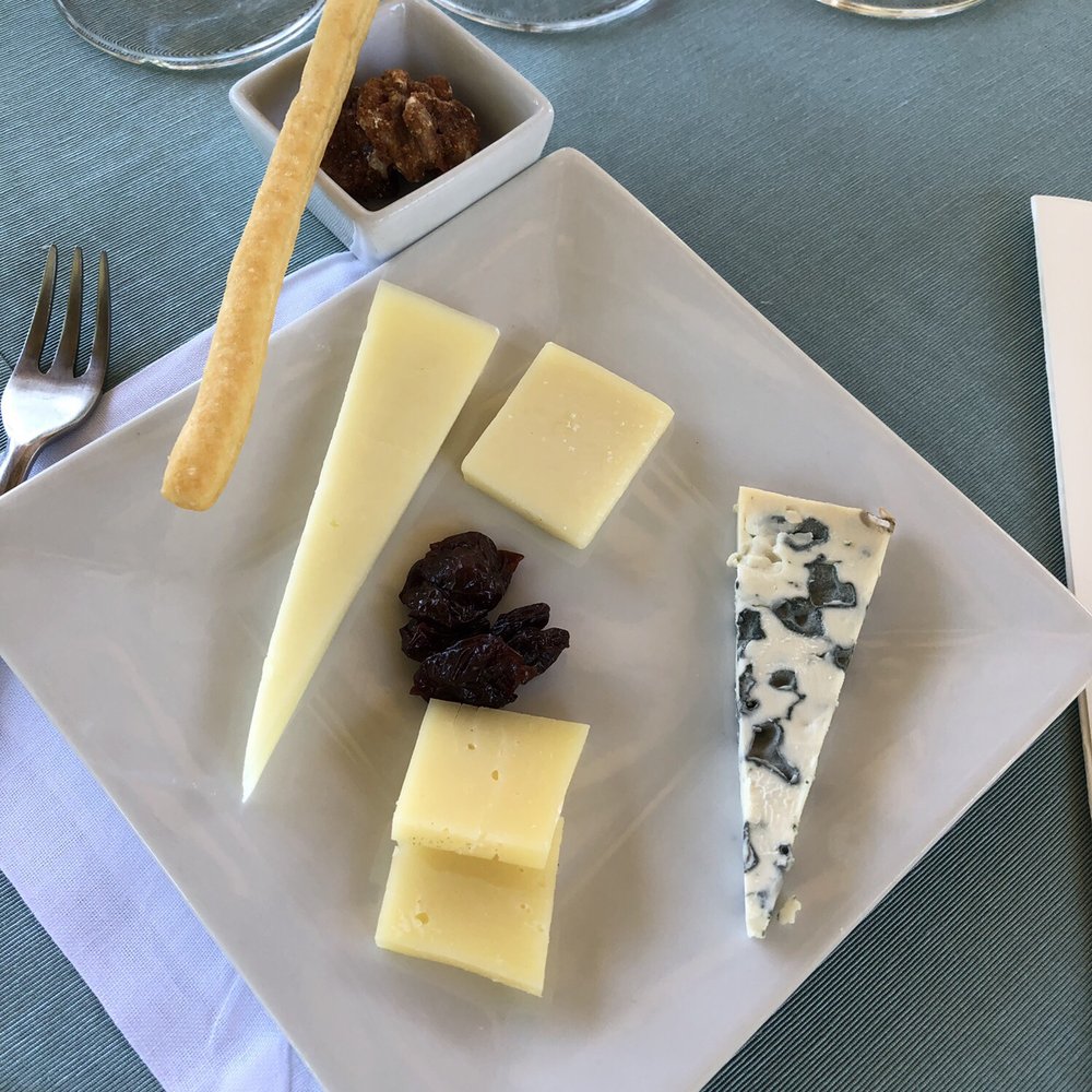 Far Niente - The cheese pairing and honey curry walnut was so delicious! - Wineries Near Me - Oakville, California Far Niente - The cheese pairing and honey curry walnut was so delicious! - Wineries Near Me - Oakville, California