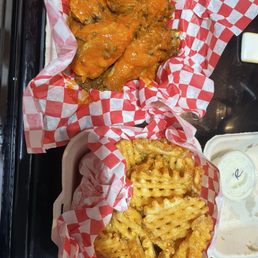 7 Bone In (7 Pc) Half Idaho Waffle Fry Buffalo hot level 3 & garlic Parmesan seasoning for fries 7 Bone In (7 Pc) Half Idaho Waffle Fry Buffalo hot level 3 & garlic Parmesan seasoning for fries