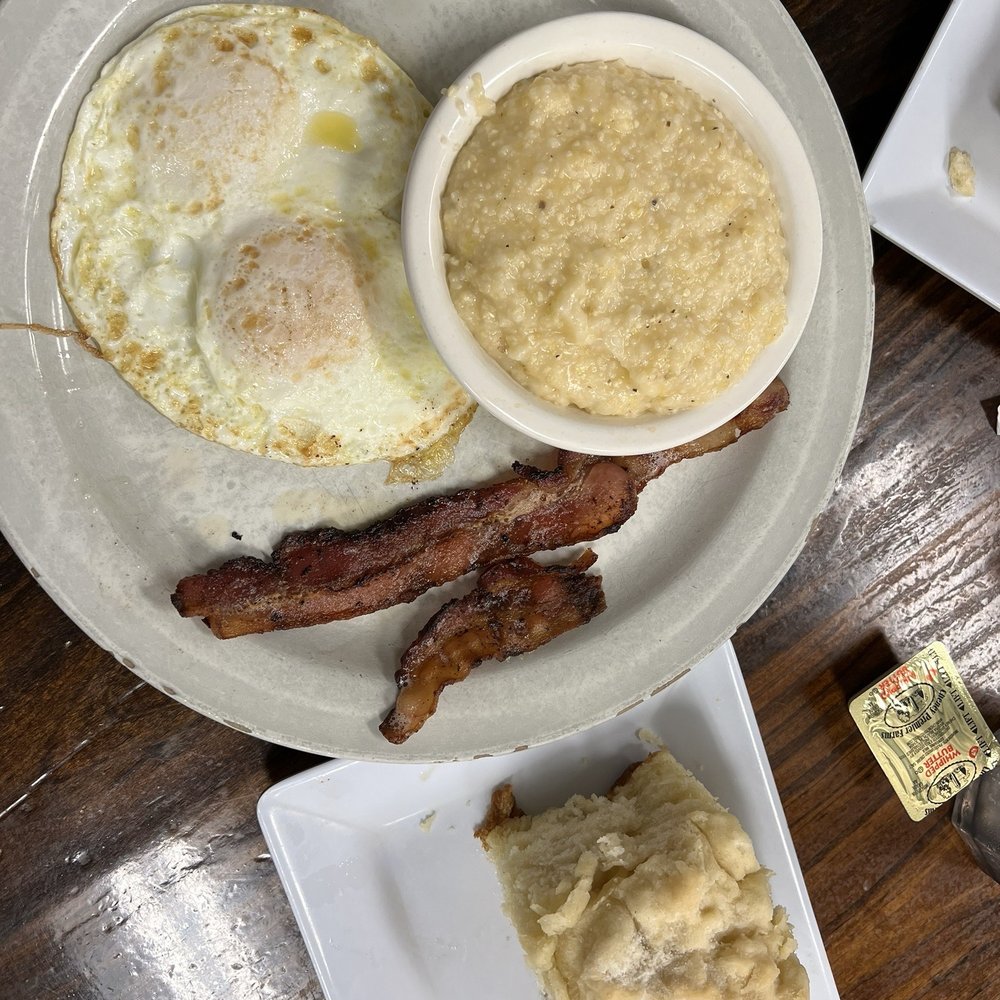 Breakfast Plate with Over Easy Eggs,Grits, Bacon, & Biscuit Breakfast Plate with Over Easy Eggs,Grits, Bacon, & Biscuit
