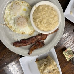 Breakfast Plate with Over Easy Eggs,Grits, Bacon, & Biscuit Breakfast Plate with Over Easy Eggs,Grits, Bacon, & Biscuit