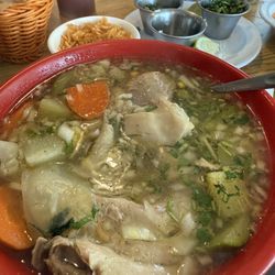 El Paraiso Mexican Restaraunt - Chicken soup. Comes with rice, tortillas, onions, cilantro and jalapeños