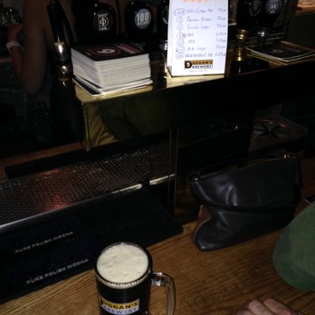 Duggan's Brewery - a mug of beer on a bar - Breweries Near Me - Toronto, Ontario