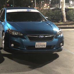 Front ceramic tint, with custom banner installed. Front ceramic tint, with custom banner installed.
