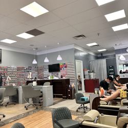 Several modern massage chairs - great color choices