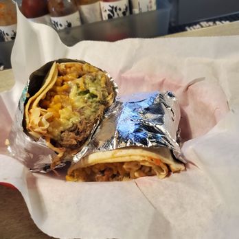 Cosmic Burrito Tequila Bar, Food Truck and catering - two burritos wrapped in foil - Bars Near Me - Charter Twp, Michigan Cosmic Burrito Tequila Bar, Food Truck and catering - two burritos wrapped in foil - Bars Near Me - Charter Twp, Michigan