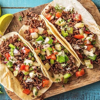 the Deli at Pecan Square - three tacos on a cutting board - Delis Near Me - Salisbury, Maryland the Deli at Pecan Square - three tacos on a cutting board - Delis Near Me - Salisbury, Maryland