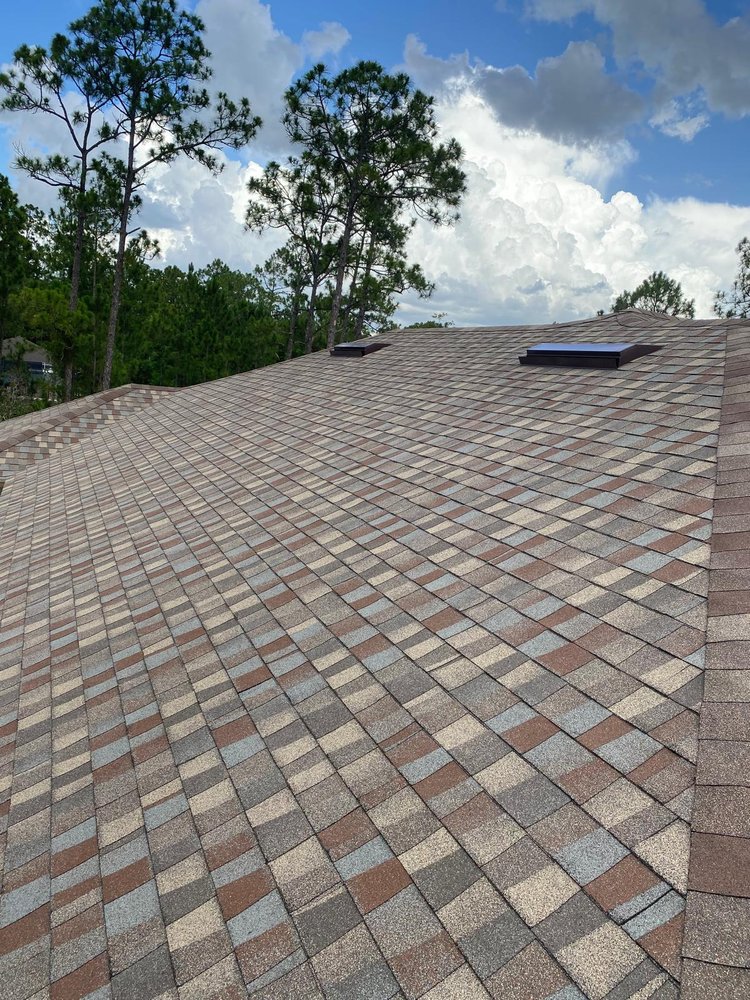 Slide of D’ Roofing Group